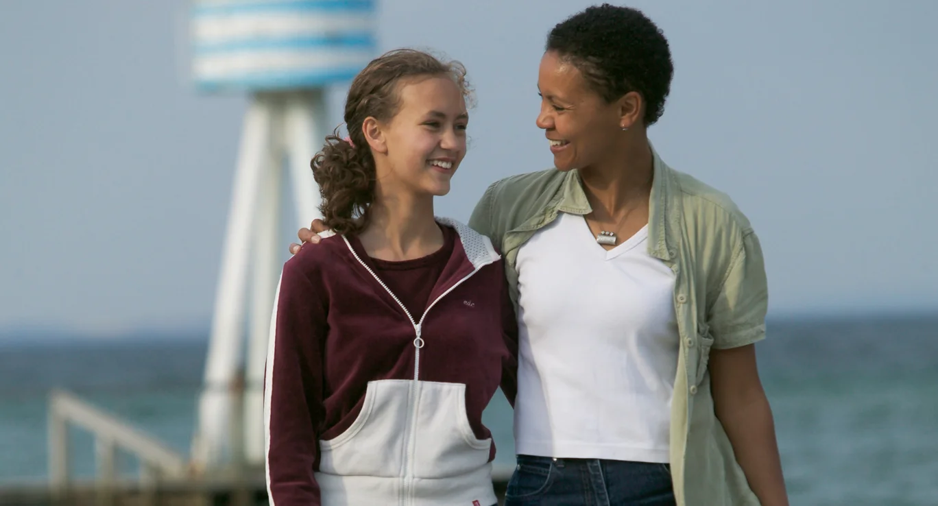 a man and a woman smiling